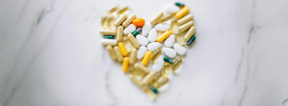 Older adult comparing a lutein eye supplement and multivitamin labels for nutrient overlap