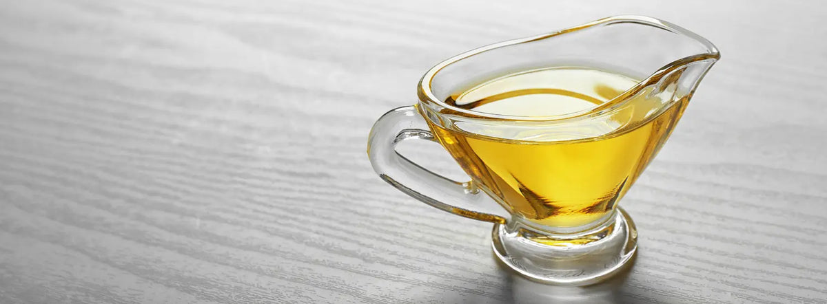 Fish oil and krill oil omega-3 supplements compared on a New Zealand kitchen bench