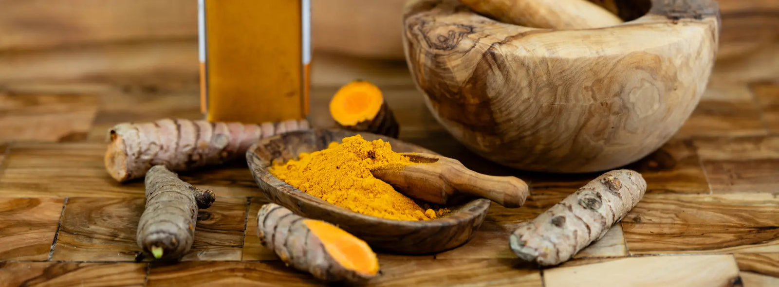 Older New Zealand shopper comparing turmeric, curcumin and curcuminoid supplement labels