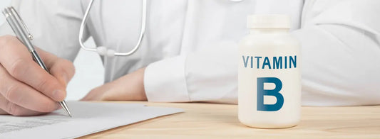 Gold Health B-complex bottle beside a supplement label in a warm New Zealand wellness setting