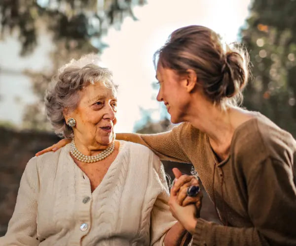 Older woman outdoors in fresh air, representing Gold Health immune support supplements
