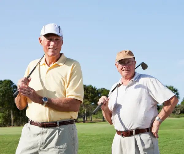 Senior man standing confidently outdoors, representing Gold Health men’s health supplements